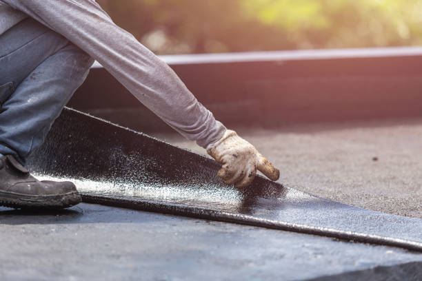 Professional Waterproofing technician working in Dowling, MI
